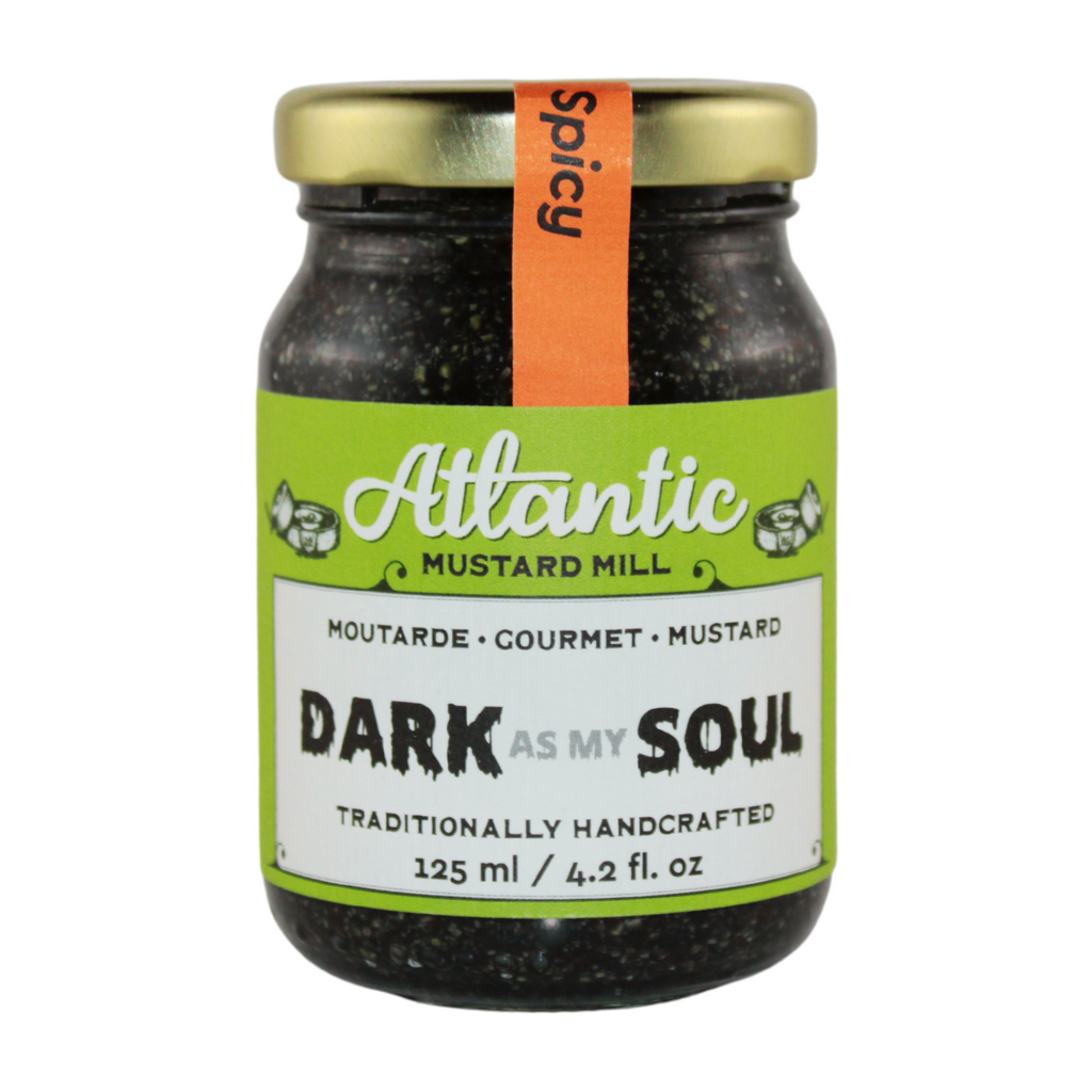 A jar of Dark as my Soul mustard - a black mustard made with charcoal