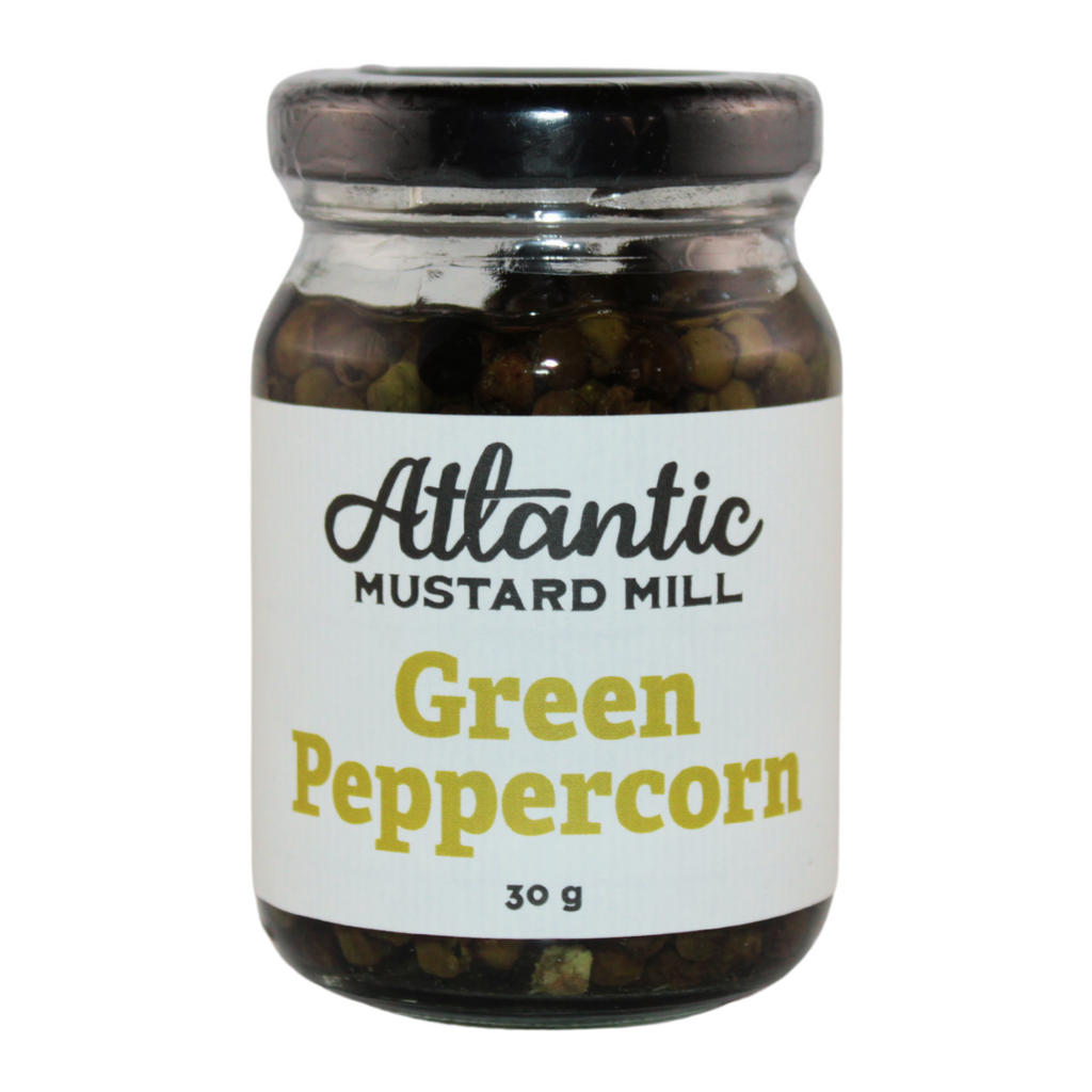 A jar of marinated green peppercorns
