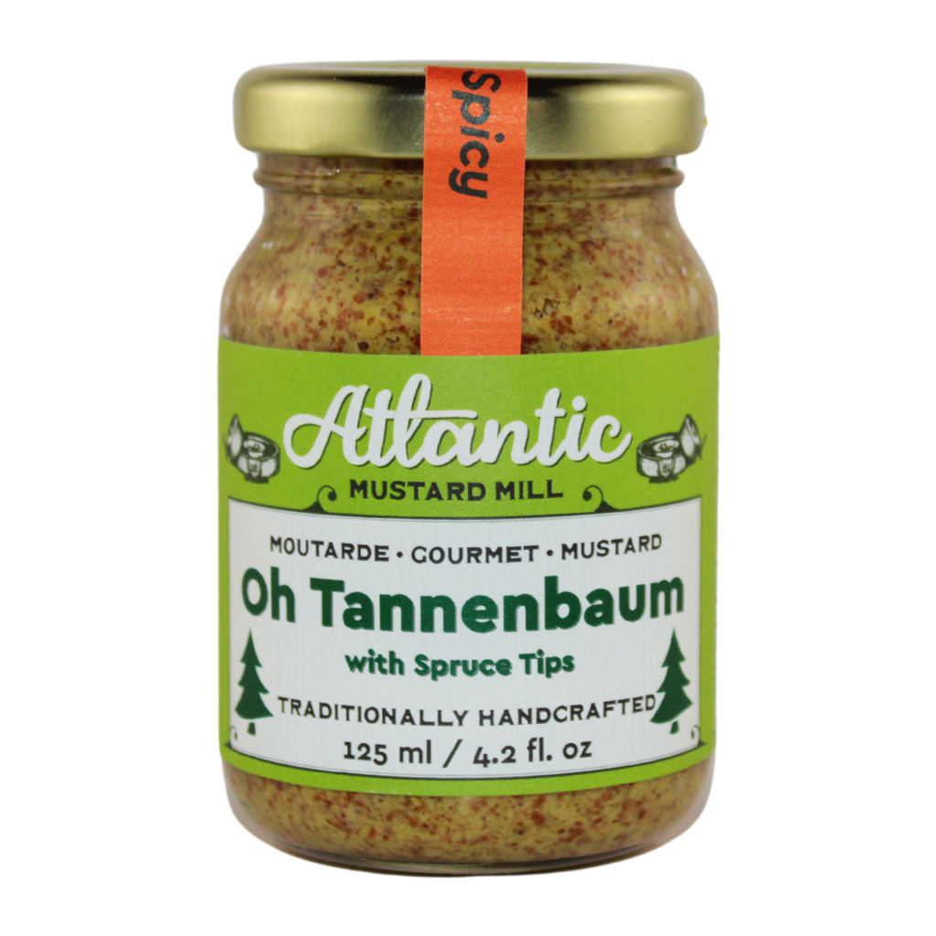A jar of Tannenbaum mustard with spruce tips