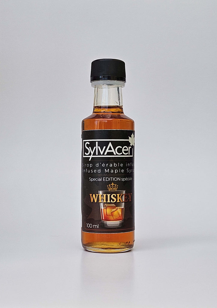 A small bottle of maple syrup infused with whiskey